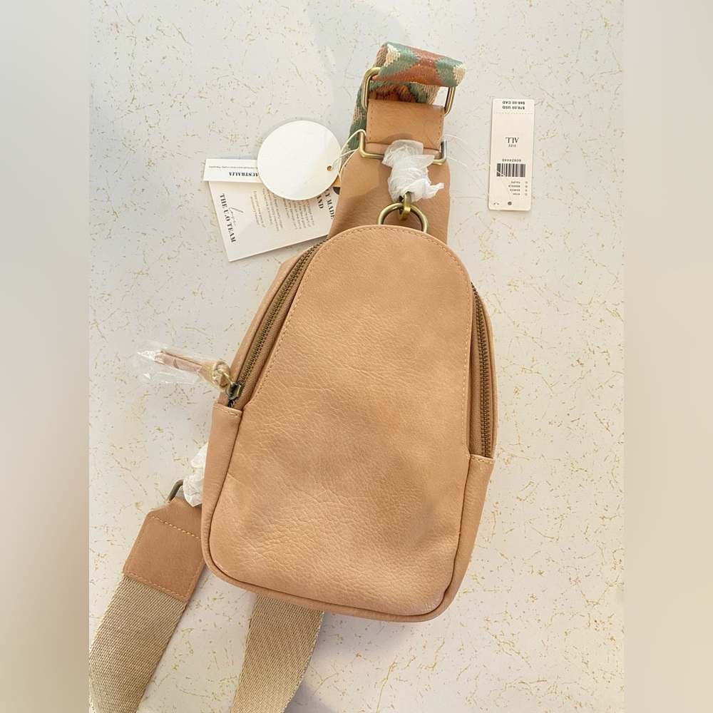 Faux leather sling backpack purse